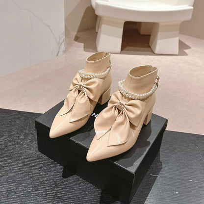SHORT BOOTS IN BISQUE CREAM SHEEPSKIN WITH BOW