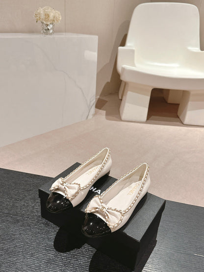 BOWKNOT BALLET FLAT IN WHITE MIX BLACK SHEEPSKIN