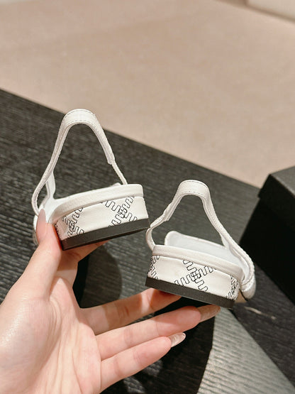 SLINGBACKS IN WHITE LAMBSKIN AND BLACK SATIN