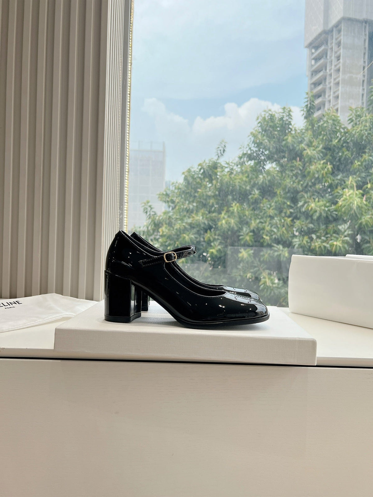 HIGH MARY JANE SHOES IN BLACK PATENT CALFSKIN