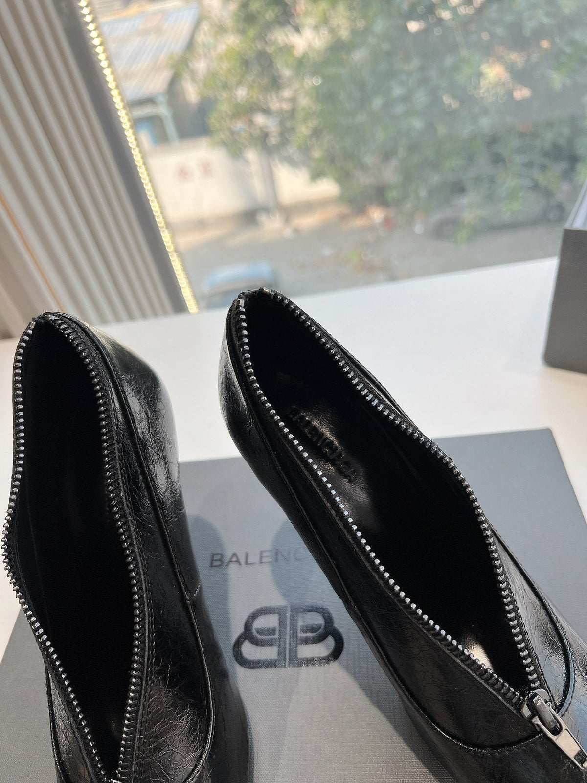 ZIPPER POINTED-TOE HIGH PUMPS IN BLACK WAX-OIL SHEEPSKIN
