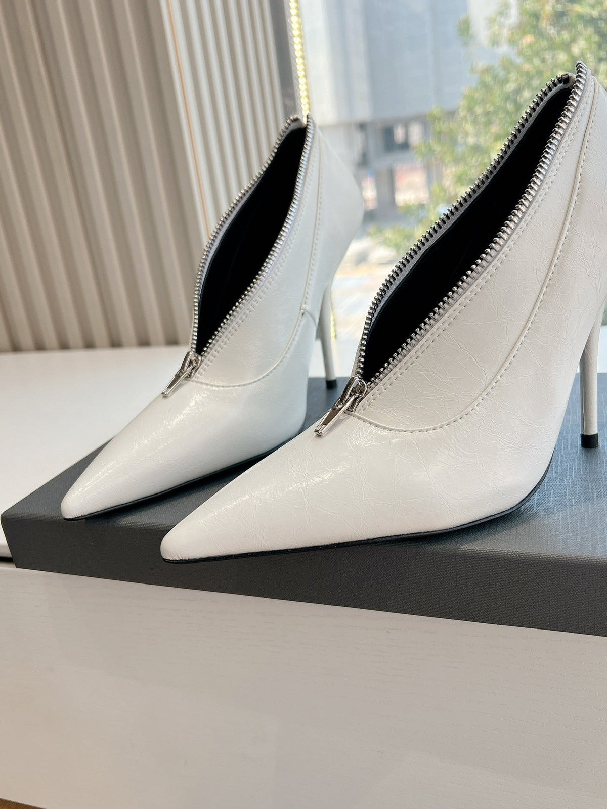 ZIPPER POINTED-TOE HIGH PUMPS IN WHITE WAX-OIL SHEEPSKIN