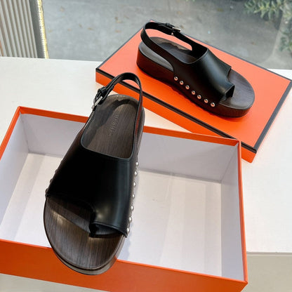FLAT SANDAL IN BLACK CALFSKIN