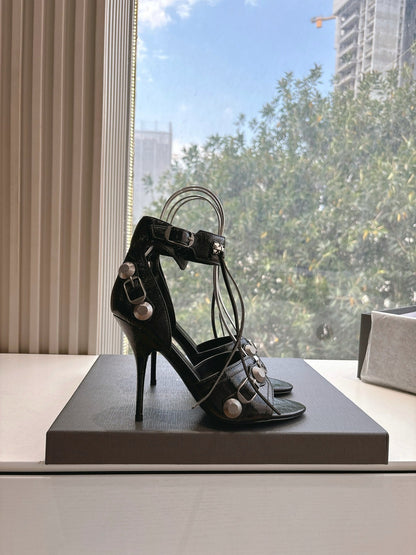 CAGOLE HIGH-HEEL SANDALS IN BLACK LAMBSKIN