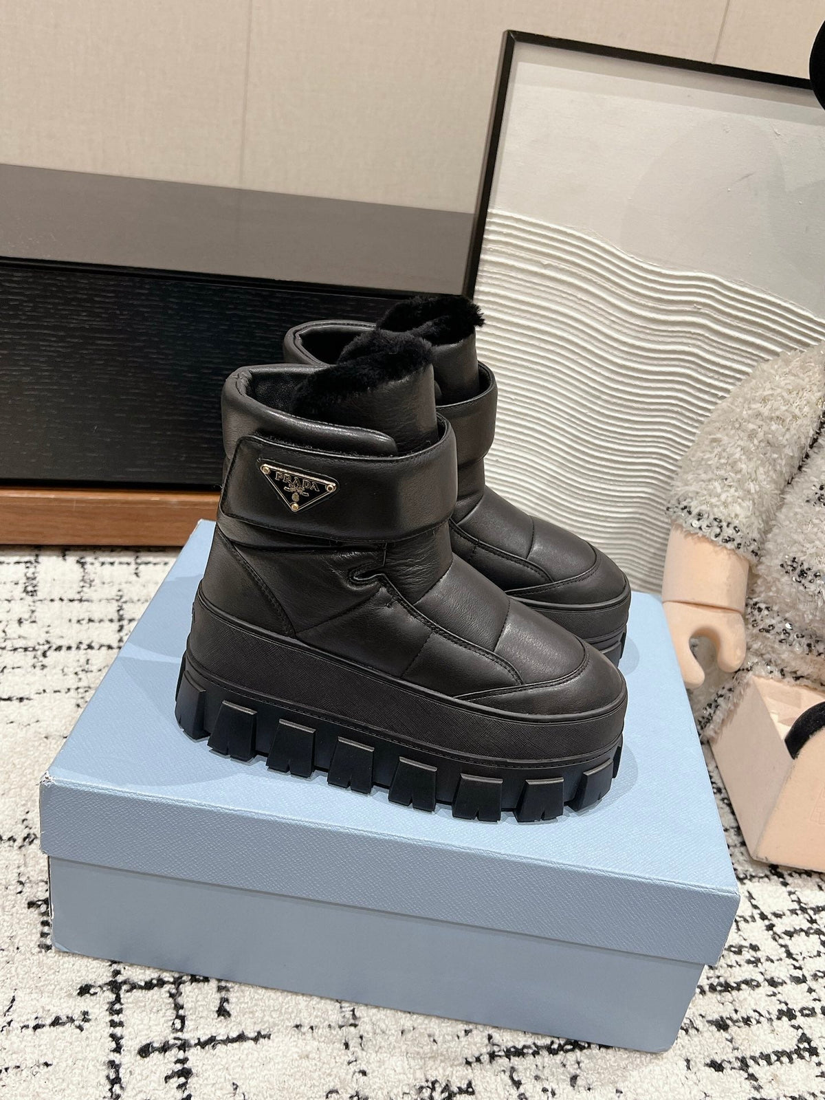 MONOLITH ANKLE BOOTS WITH STRAP IN BLACK CALFSKIN AND FLEECE LINING