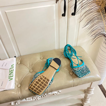 LACE-UP FLAT SANDAL IN CERULEAN BLUE METALLIZED MESH AND LEATHER WITH RHINSTONES