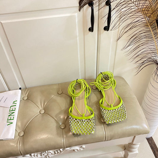 LACE-UP FLAT SANDAL IN NEON YELLOW METALLIZED MESH AND LEATHER WITH RHINSTONES