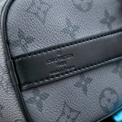 KEEPALL BANDOULIÈRE 25 IN GUN METAL MONOGRAM ECLIPSE CANVAS MIX TURQUOISE CALFSKIN