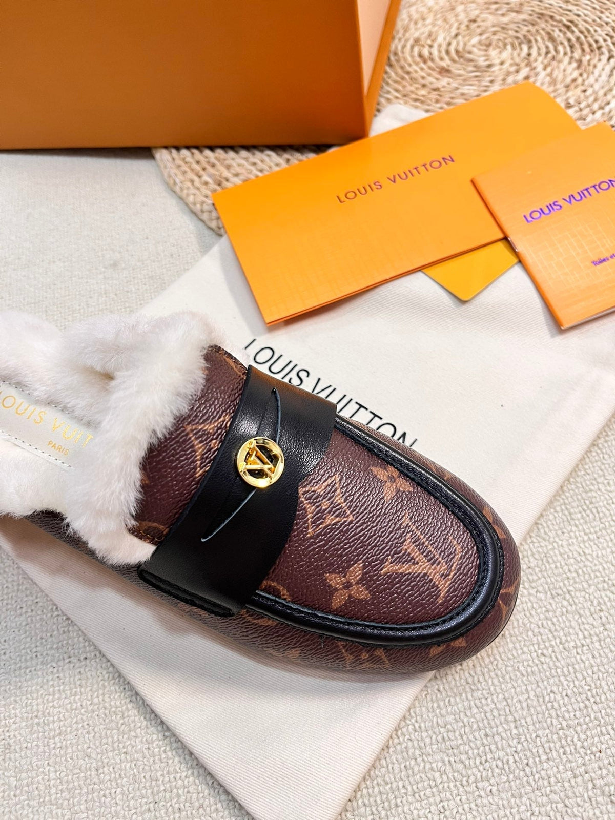 FLAT MULE IN CHESTNUT BROWN MONOGRAM CALFSKIN AND SHEARLING LINING