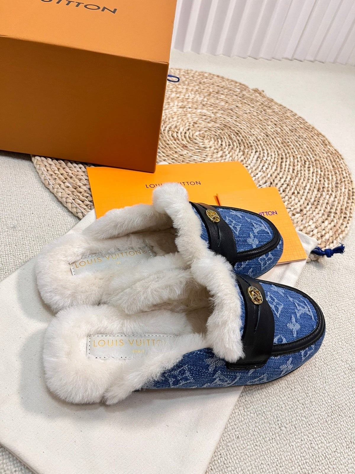 FLAT MULE IN COBALT BLUE MONOGRAM DENIM AND SHEARLING LINING