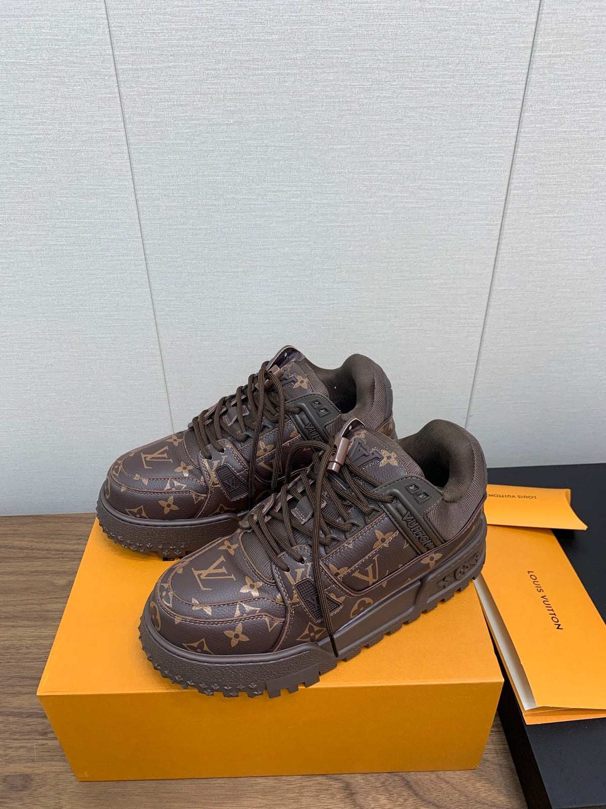 LV TRAINER IN CHOCOLATE BROWN MONOGRAM CALFSKIN