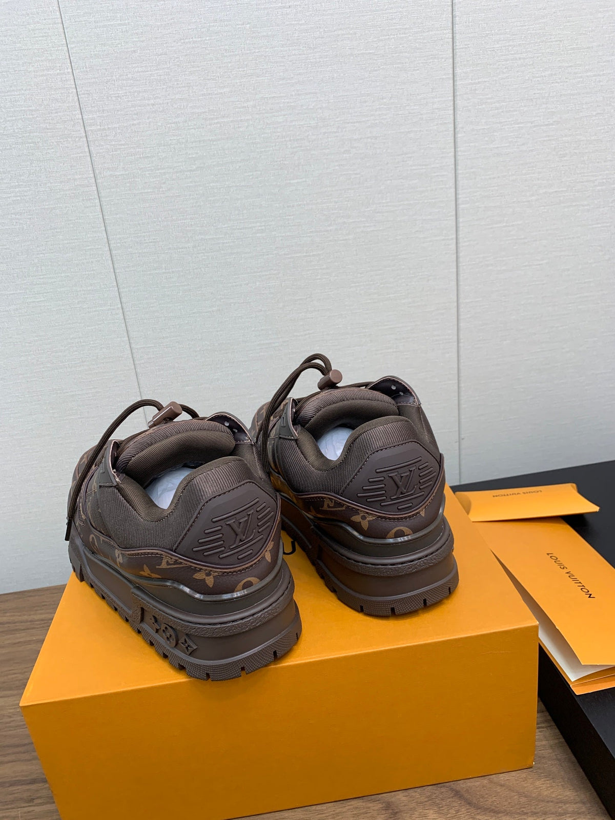 LV TRAINER IN CHOCOLATE BROWN MONOGRAM CALFSKIN