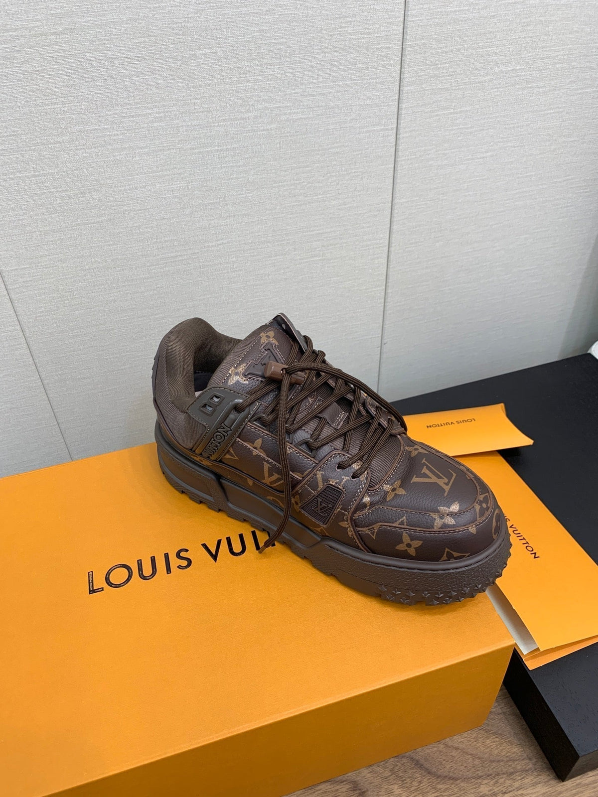 LV TRAINER IN CHOCOLATE BROWN MONOGRAM CALFSKIN