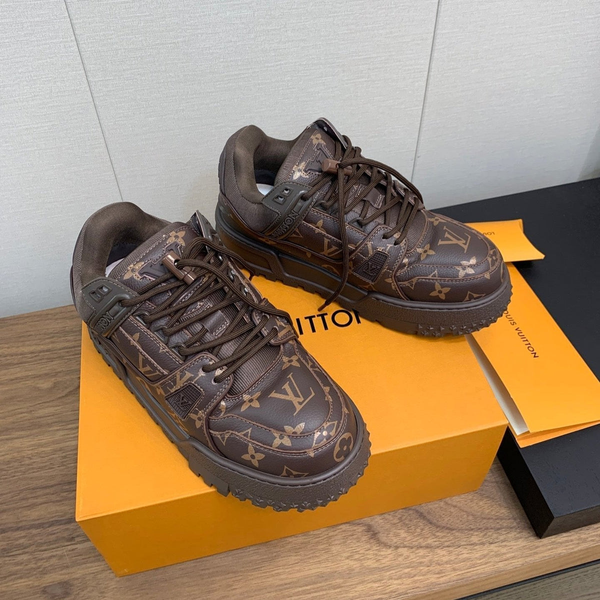 LV TRAINER IN CHOCOLATE BROWN MONOGRAM CALFSKIN