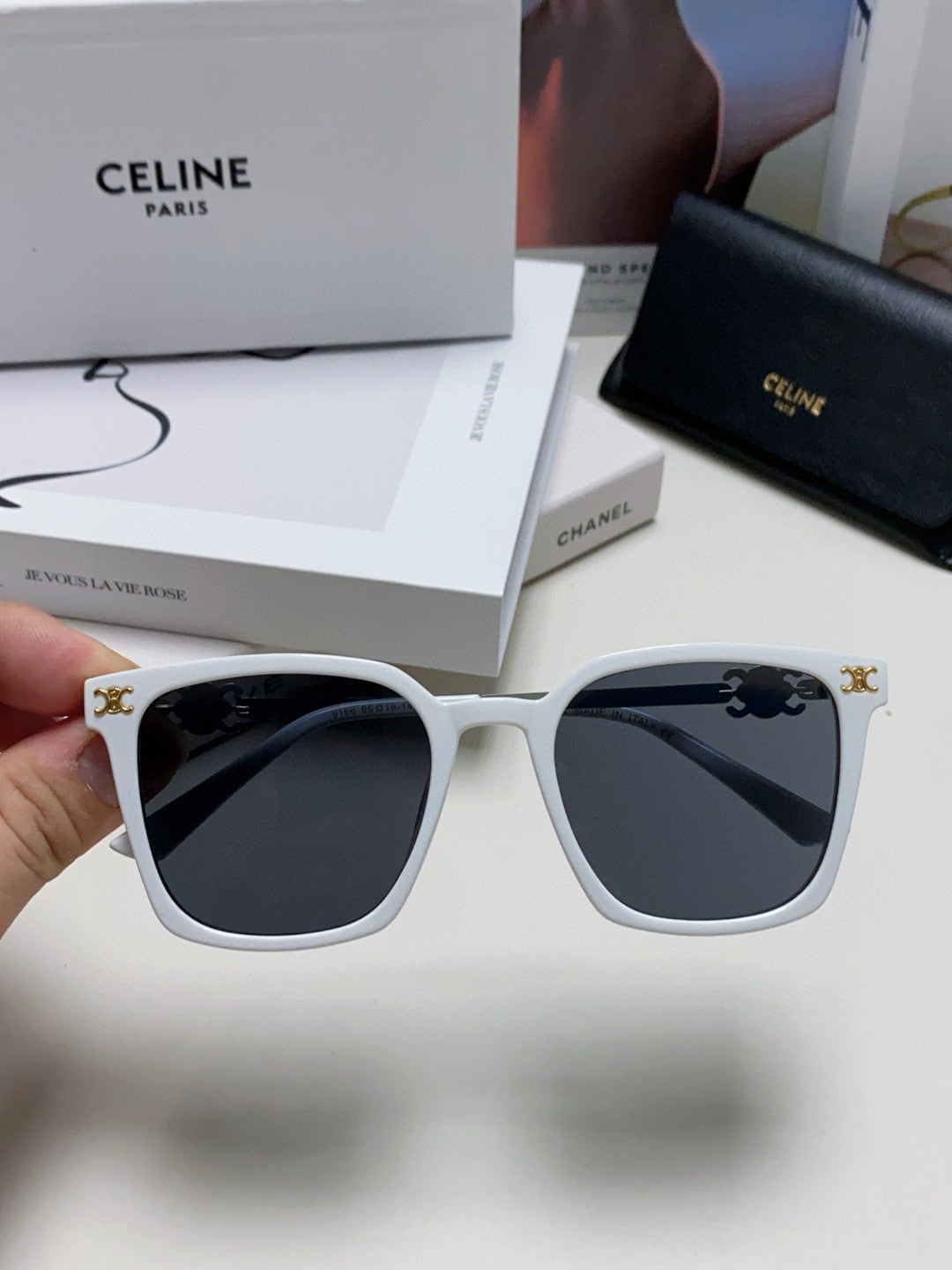 TRIOMPHE SUNGLASS 497817 IN WHITE METAL BLACK LENSES