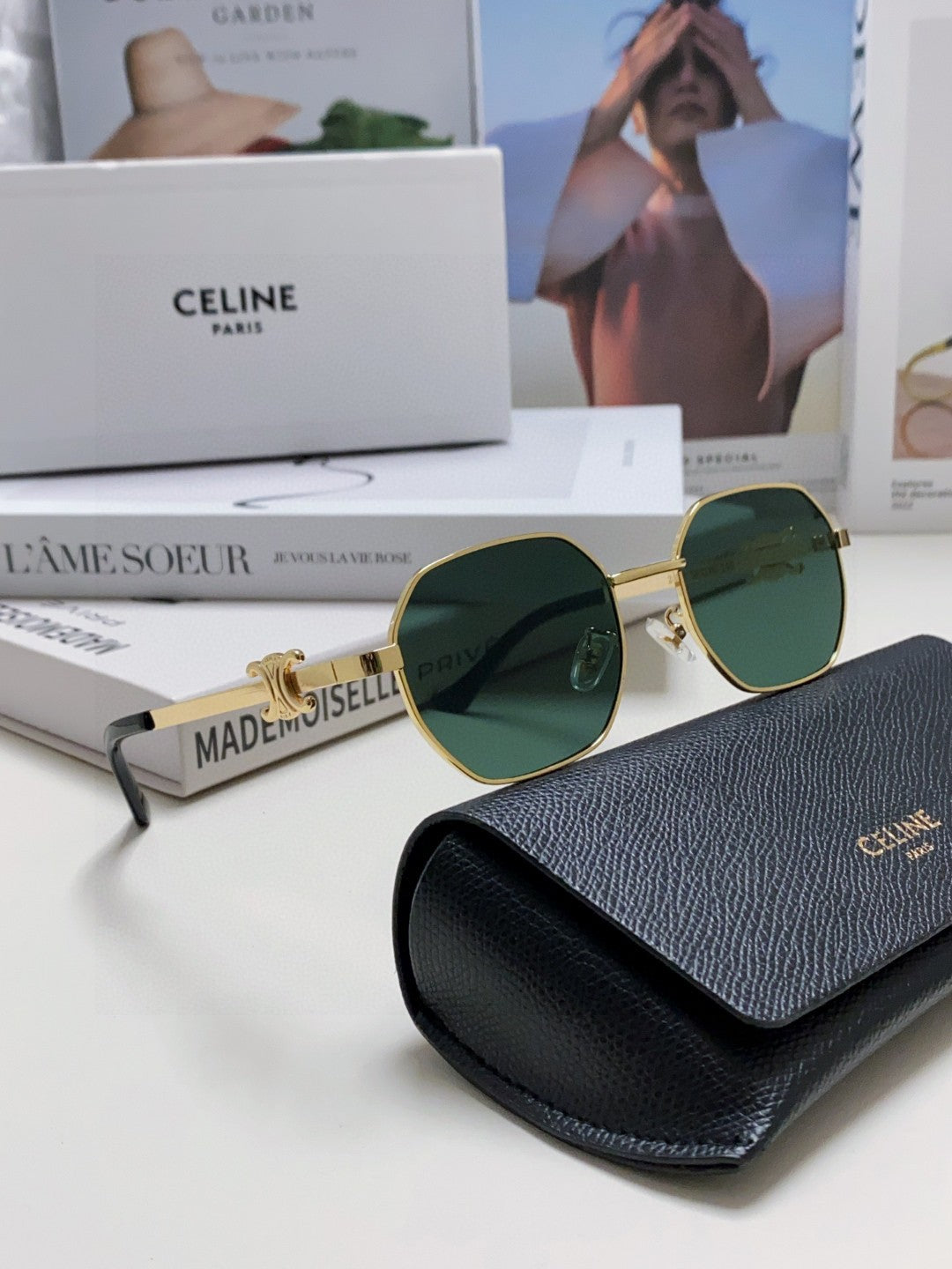 TRIOMPHE SUNGLASS 497821 IN GOLD METAL DARK TEAL LENSES