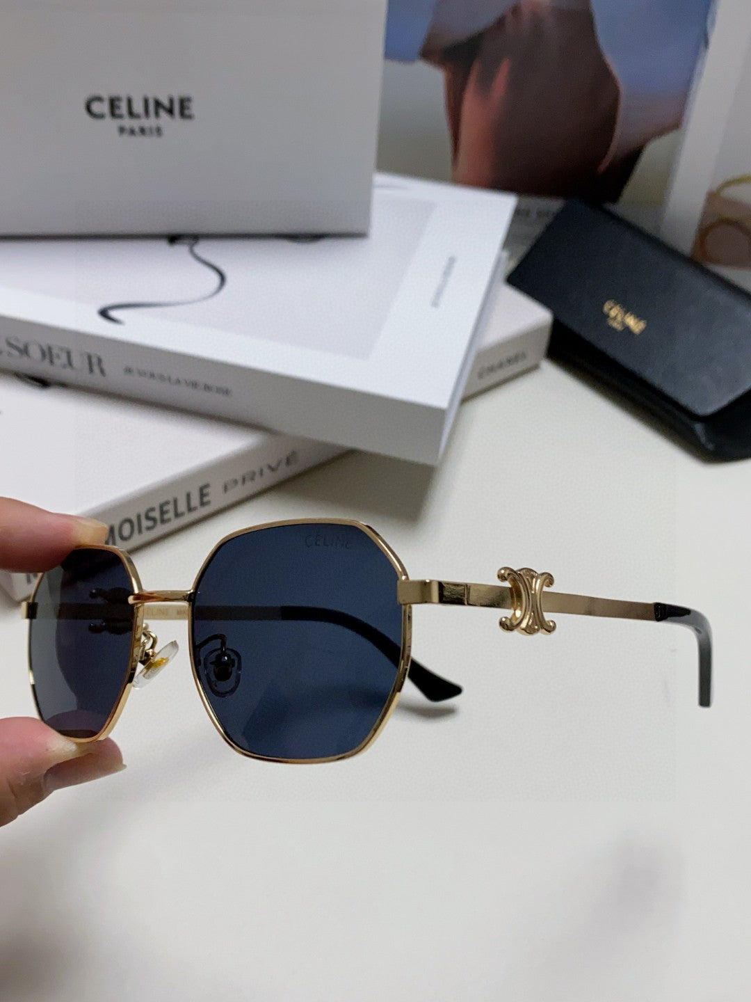 TRIOMPHE SUNGLASS 497823 IN GOLD METAL BLACK LENSES