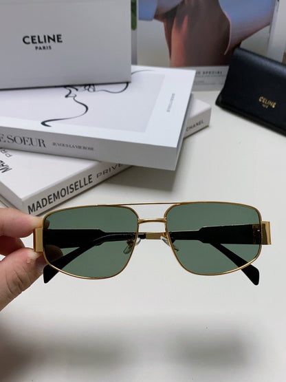 TRIOMPHE SUNGLASS 512997 IN GOLD METAL BLUE LENSES
