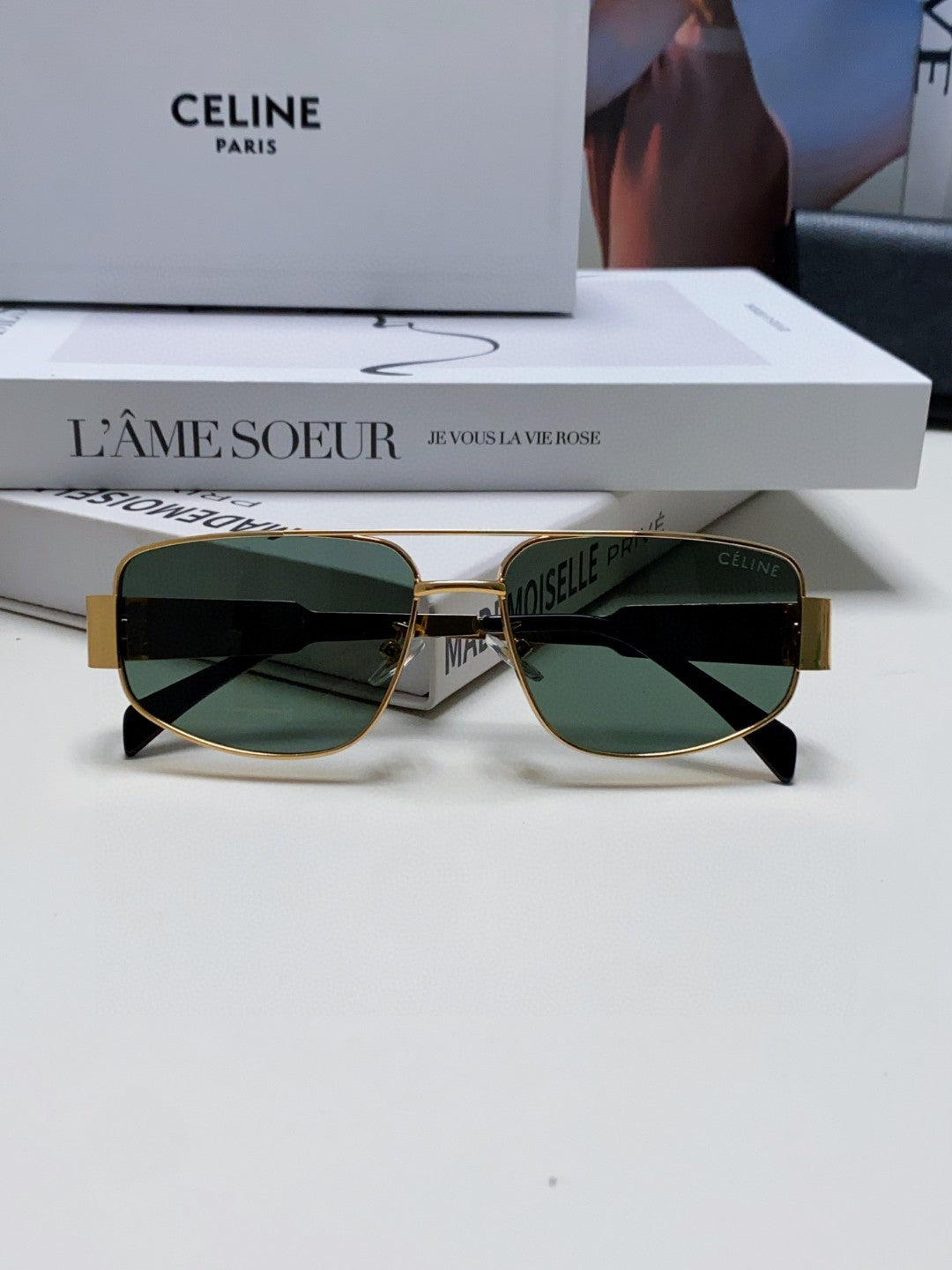 TRIOMPHE SUNGLASS 512997 IN GOLD METAL BLUE LENSES
