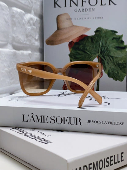 TRIOMPHE SUNGLASSES 552774 IN CARAMEL ACETATE TEXT LOGO