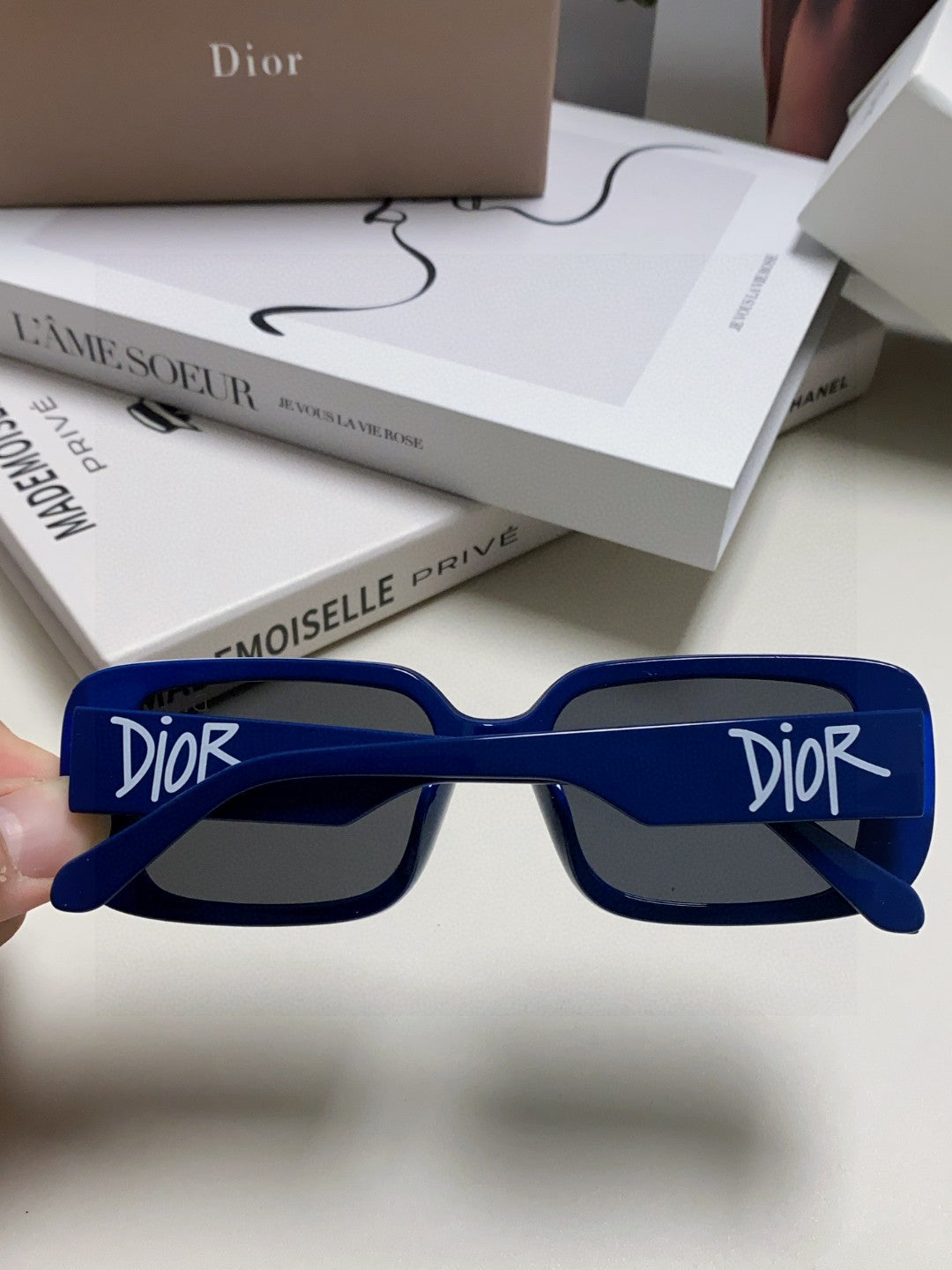 MONTAIGNE SUNGLASS 571595 IN BLUE ACETATE TEXT LOGO