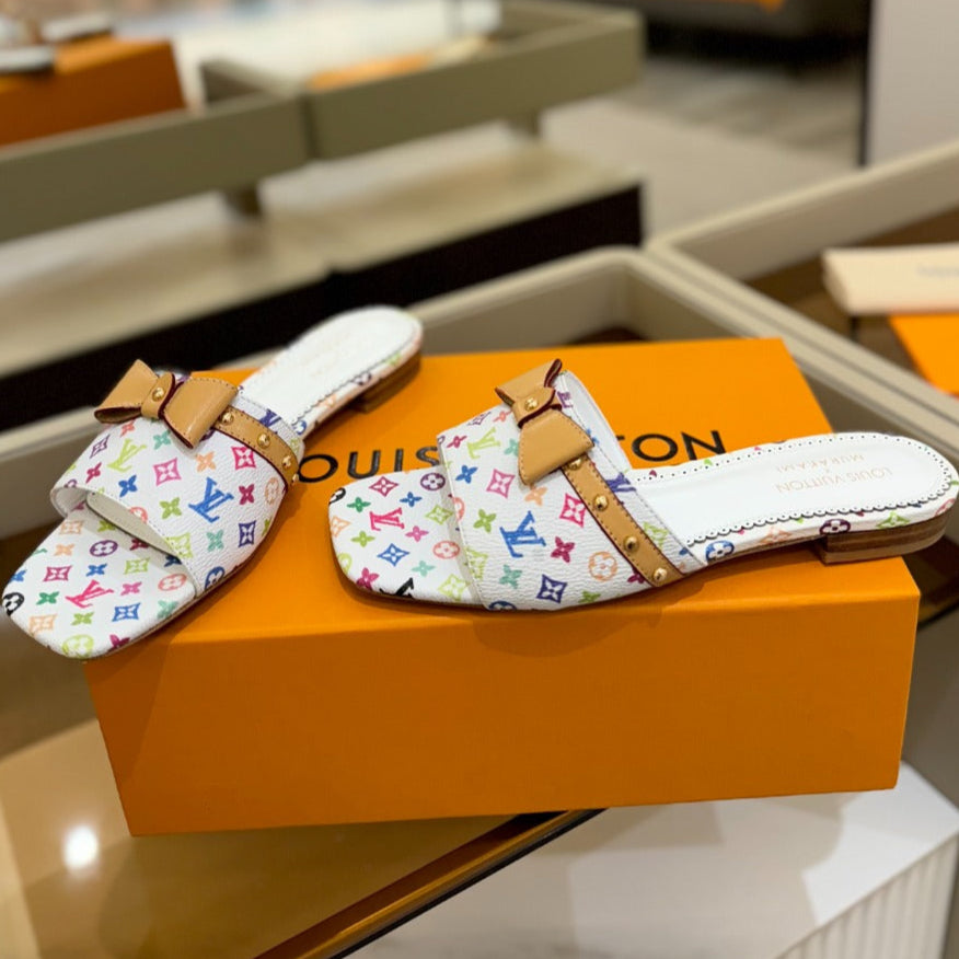 LV X TM 6AM FLAT MULE IN WHITE MONOGRAM CALFSKIN