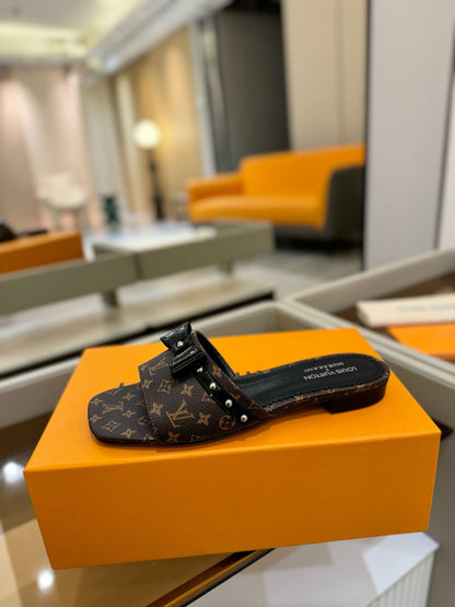 LV X TM 6AM FLAT MULE IN CHOCOLATE BROWN MONOGRAM CALFSKIN