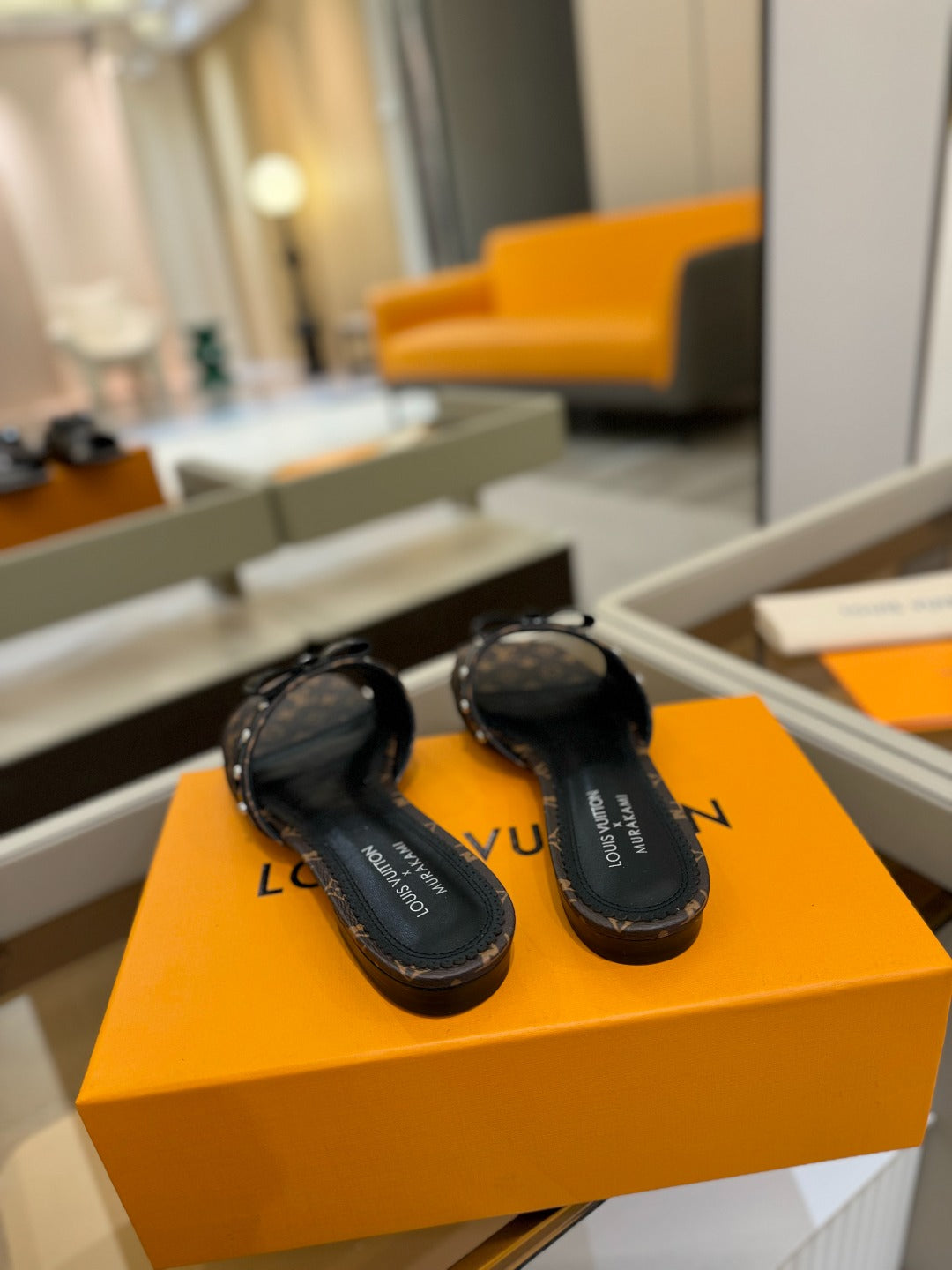 LV X TM 6AM FLAT MULE IN CHOCOLATE BROWN MONOGRAM CALFSKIN