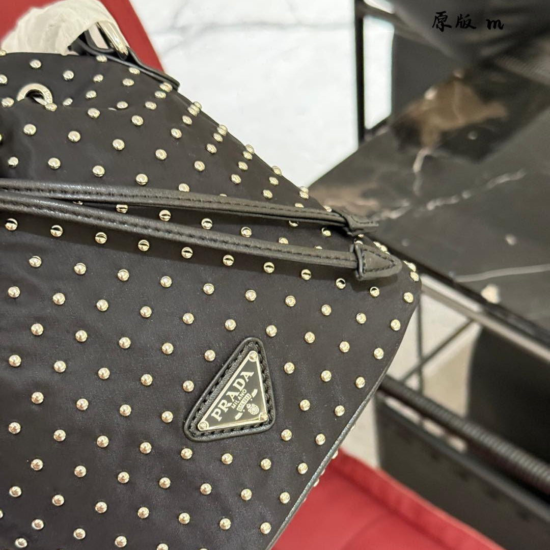 STUDDED DRAWSTRING BUCKET BAG 20 IN BLACK RE-NYLON MIX CALFSKIN
