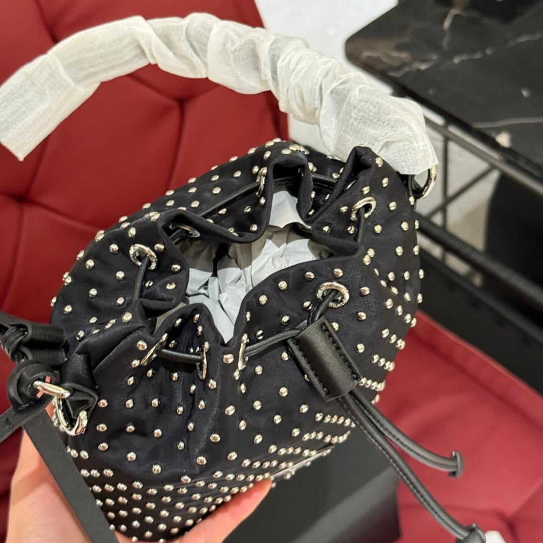 STUDDED DRAWSTRING BUCKET BAG 20 IN BLACK RE-NYLON MIX CALFSKIN