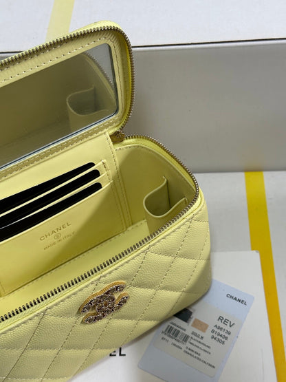 VANITY CASE 17 CRYSTAL STUDDED LOGO IN YELLOW CALFSKIN GOLD HARDWARE