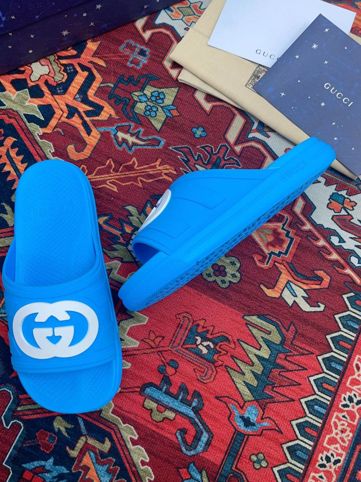 GG INTERLOCKING G SLIDE SANDAL BRIGHT BLUE RUBBER