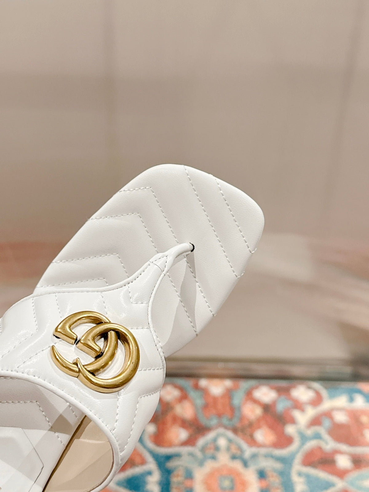HIGH THONG MULE 55MM IN WHITE CALFSKIN WITH GOLD HARDWARE
