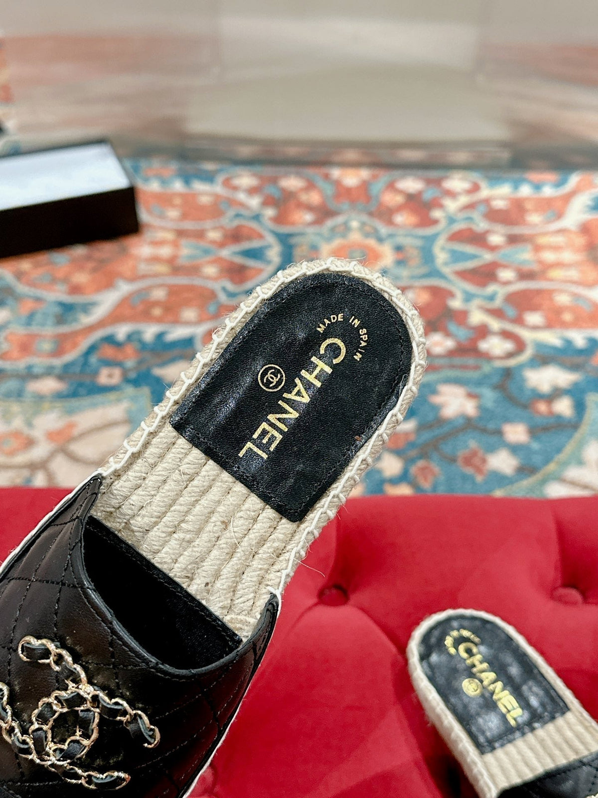 FLAT SLIPPERS IN BLACK LAMBSKIN AND WOVEN WITH LOGO