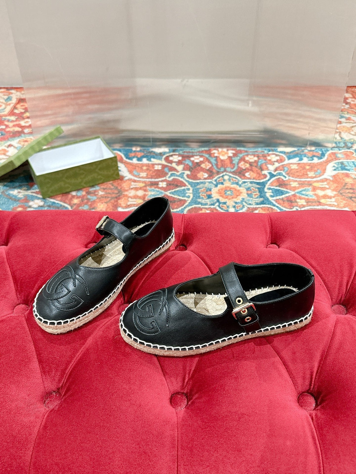 GG CROSS STRAP FLAT SHOES IN BLACK CALFSKIN WITH STRAW SOLE