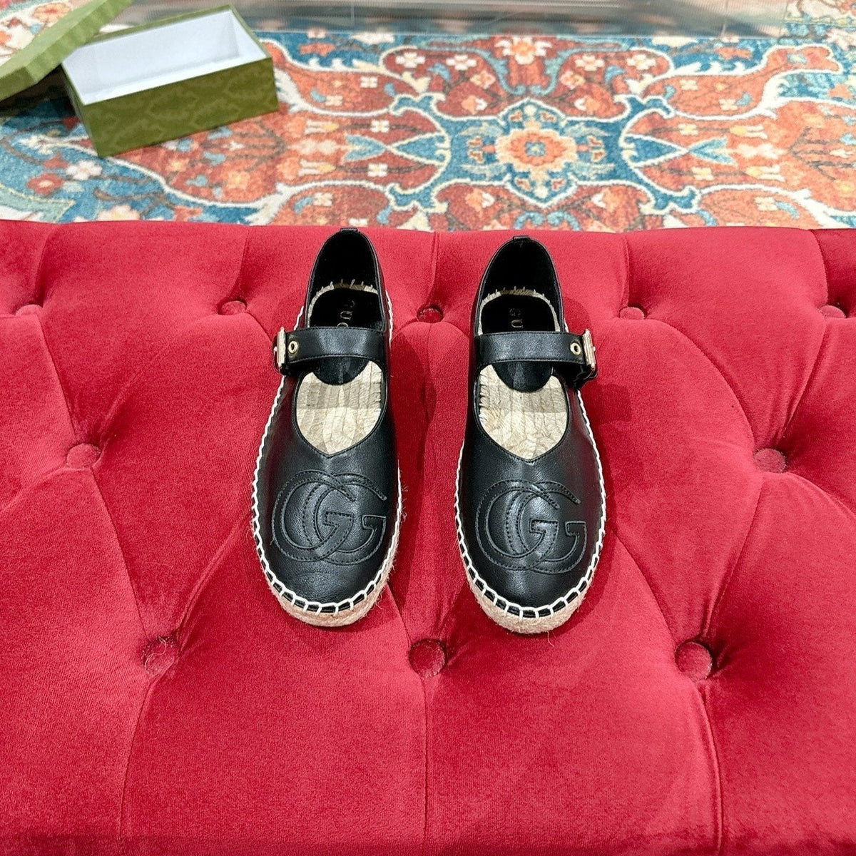 GG CROSS STRAP FLAT SHOES IN BLACK CALFSKIN WITH STRAW SOLE