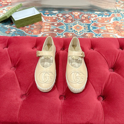 GG CROSS STRAP FLAT SHOES IN BEIGE CALFSKIN WITH STRAW SOLE