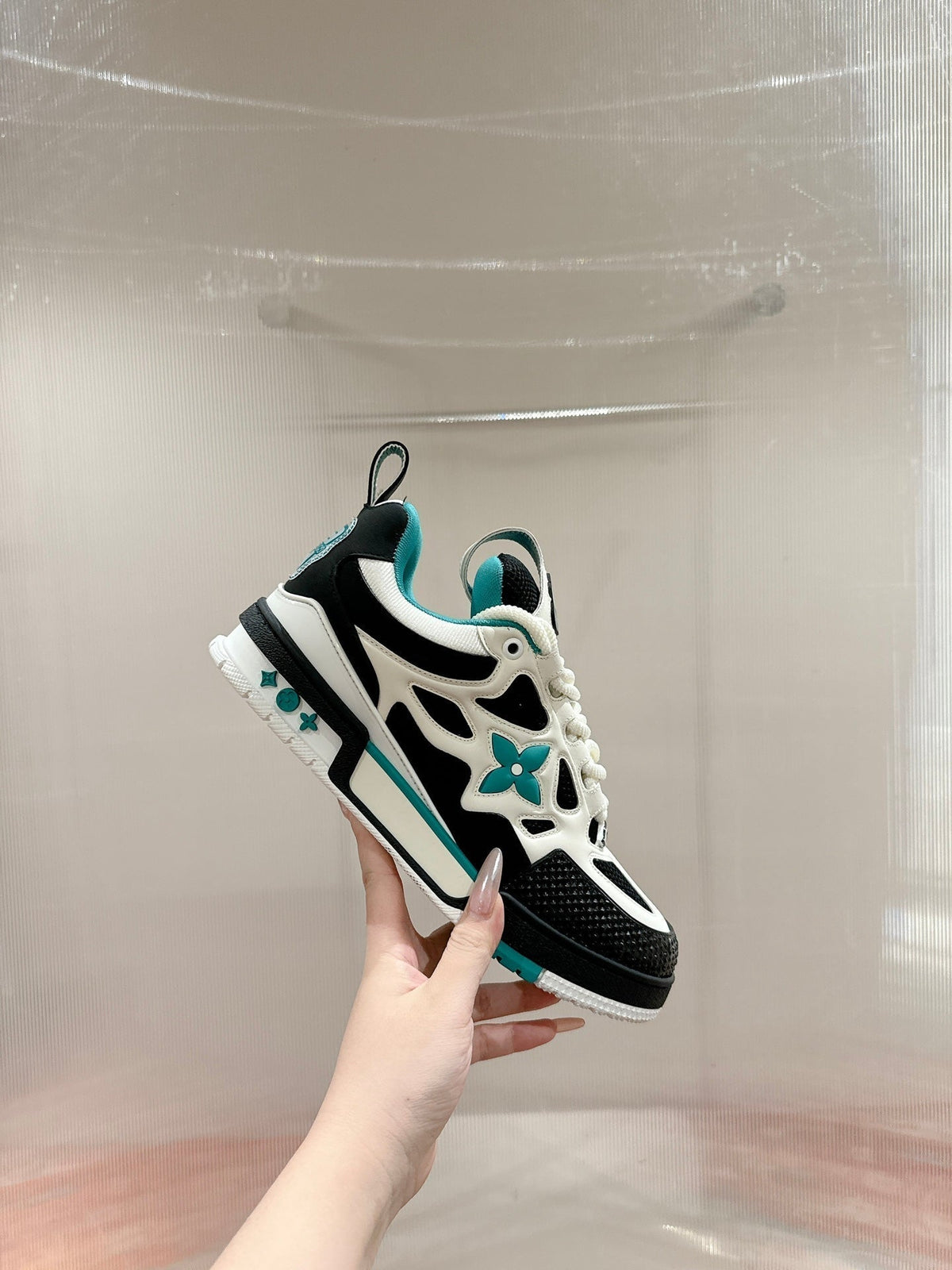 LV SKATE SNEAKER IN WHITE MIX BLACK AND PERSIAN GREEN CALFSKIN