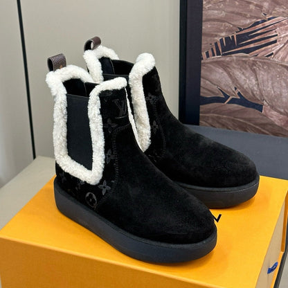 ASPEN CHELSEA ANKLE BOOTS IN BLACK MONOGRAM-DEBOSSED SUEDE