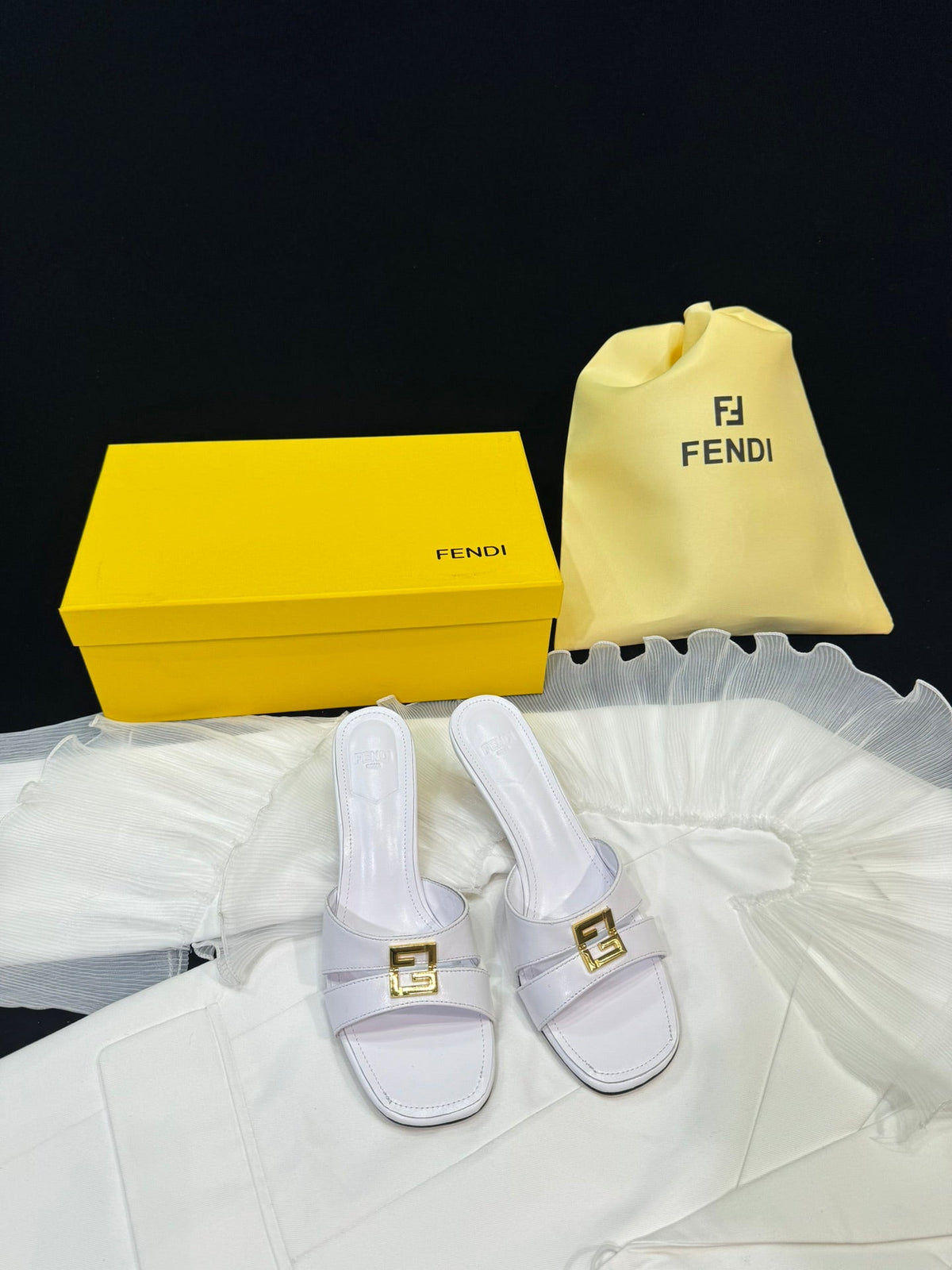 FENDI MEDIUM-HEELED 55 MM MULE IN WHITE LAMBSKIN WITH GOLD HARDWARE