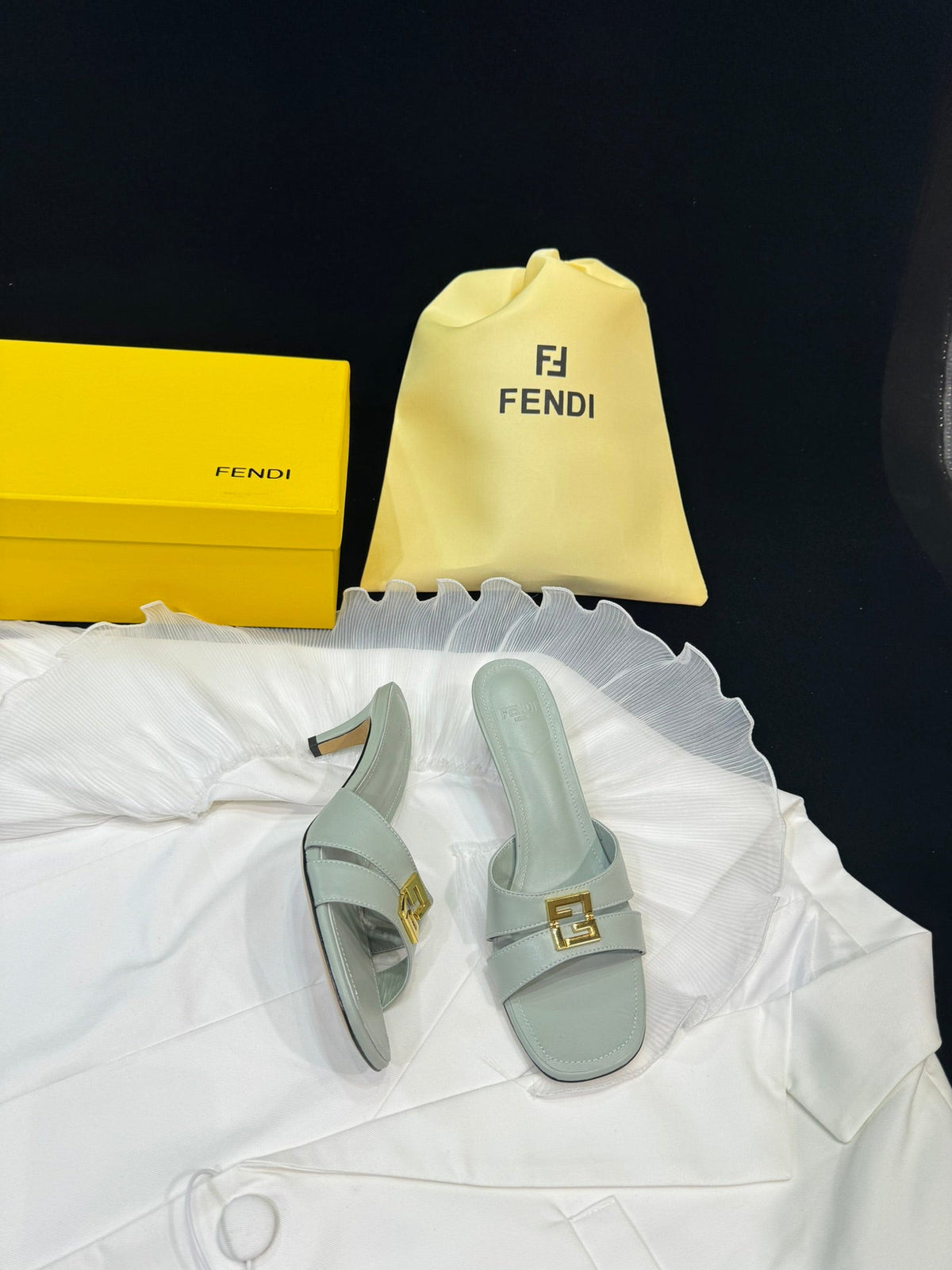 FENDI MEDIUM-HEELED 55 MM MULE IN ASH GREY LAMBSKIN WITH GOLD HARDWARE