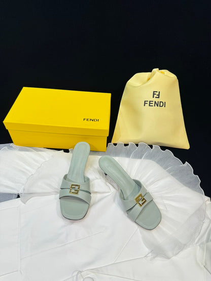 FENDI MEDIUM-HEELED 55 MM MULE IN ASH GREY LAMBSKIN WITH GOLD HARDWARE