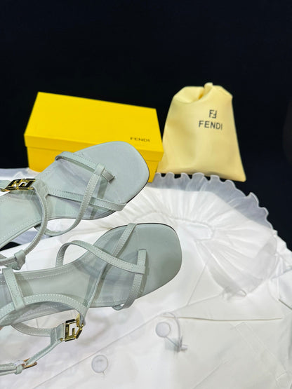 FENDI FFOLD MEDIUM-HEELED 55 MM SANDALS IN ASH GREY LAMBSKIN WITH GOLD HARDWARE