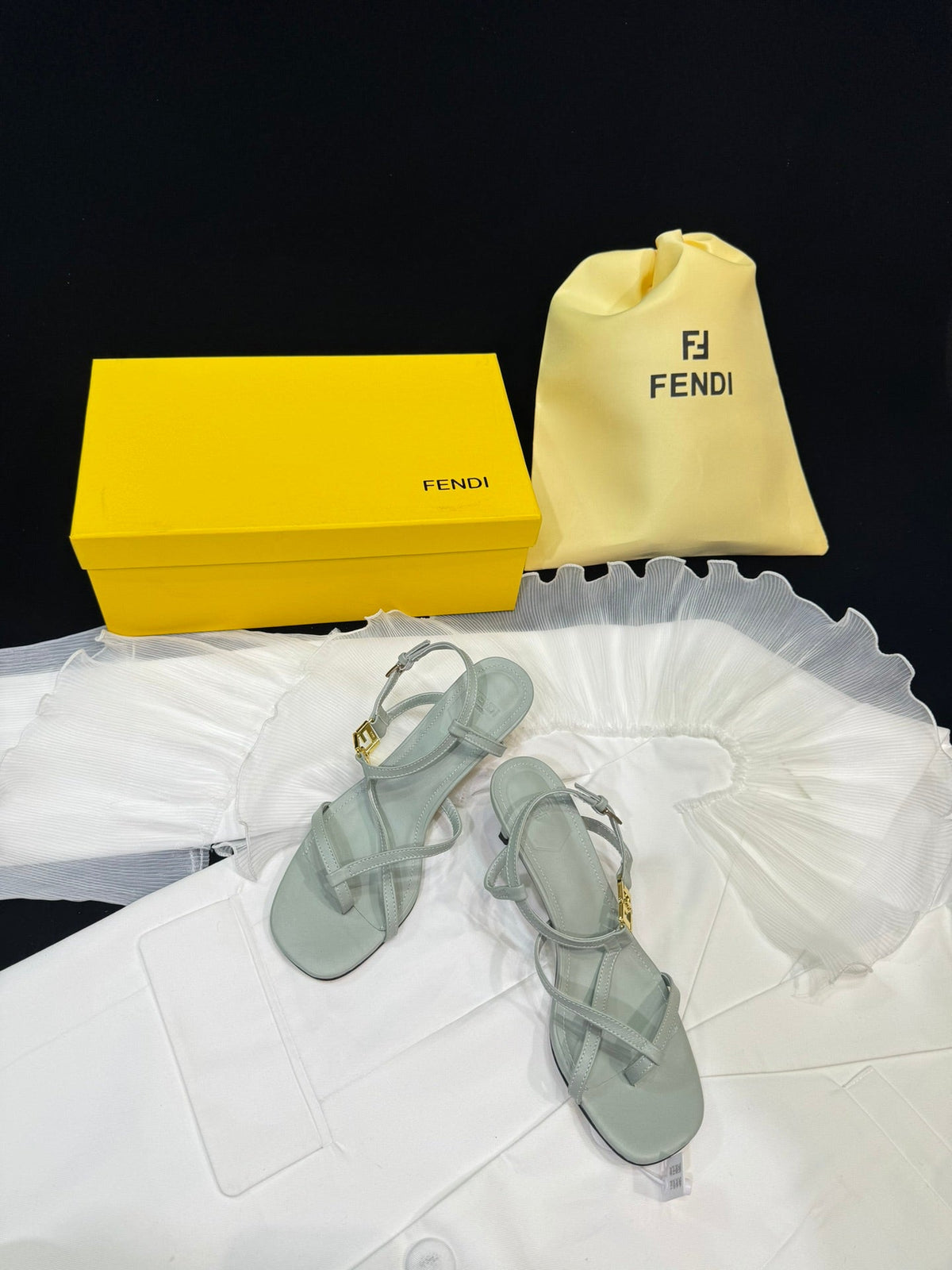 FENDI FFOLD MEDIUM-HEELED 55 MM SANDALS IN ASH GREY LAMBSKIN WITH GOLD HARDWARE