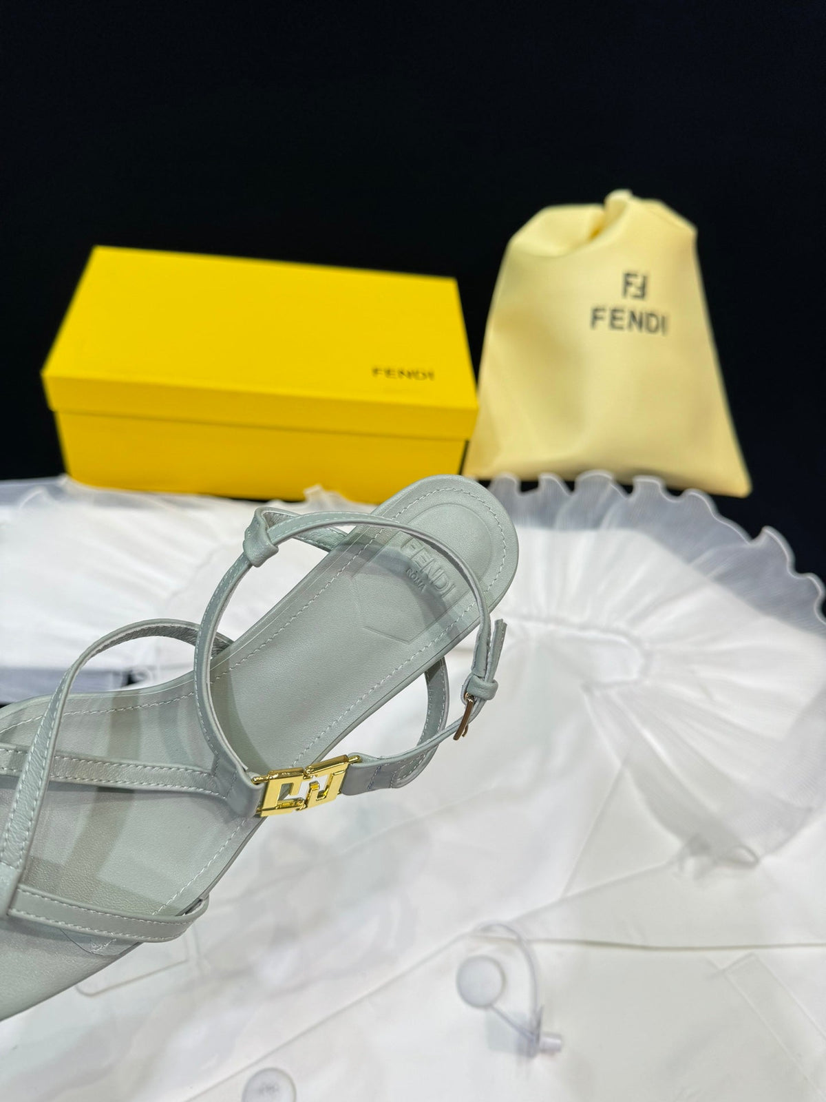 FENDI FFOLD MEDIUM-HEELED 55 MM SANDALS IN ASH GREY LAMBSKIN WITH GOLD HARDWARE