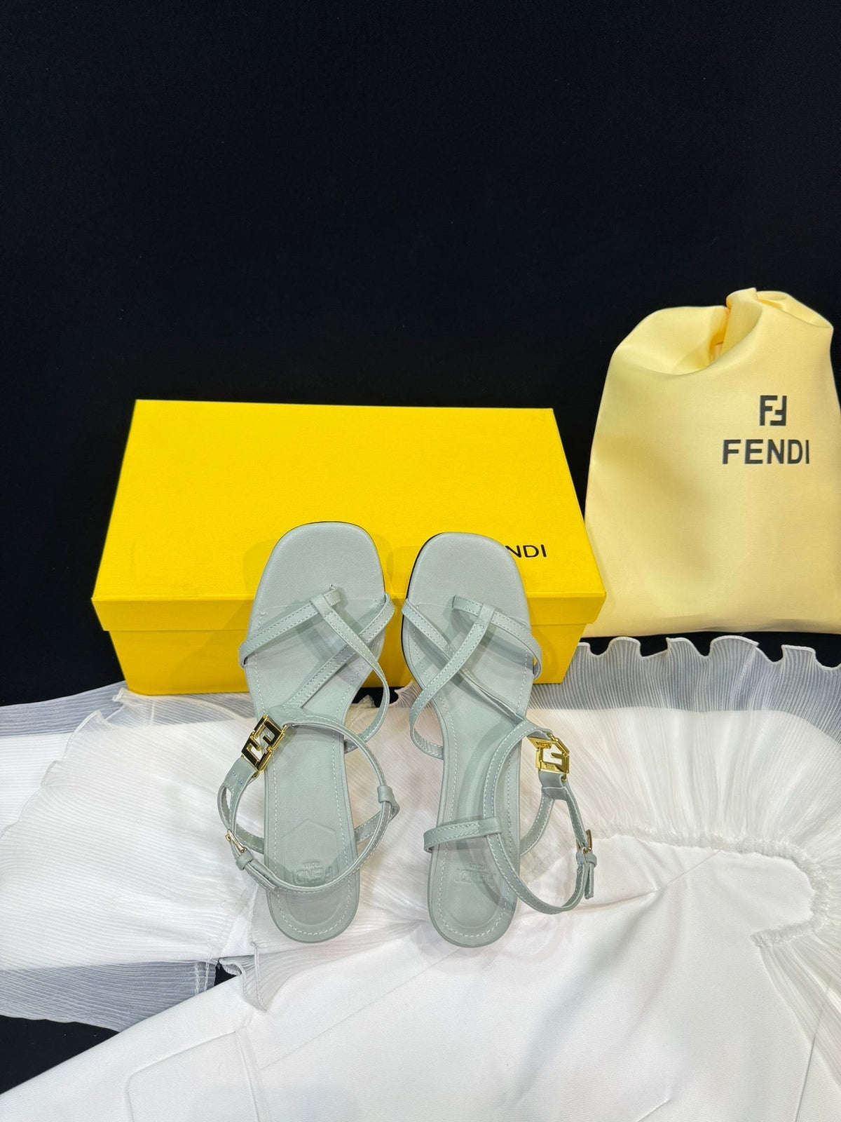 FENDI FFOLD MEDIUM-HEELED 55 MM SANDALS IN ASH GREY LAMBSKIN WITH GOLD HARDWARE