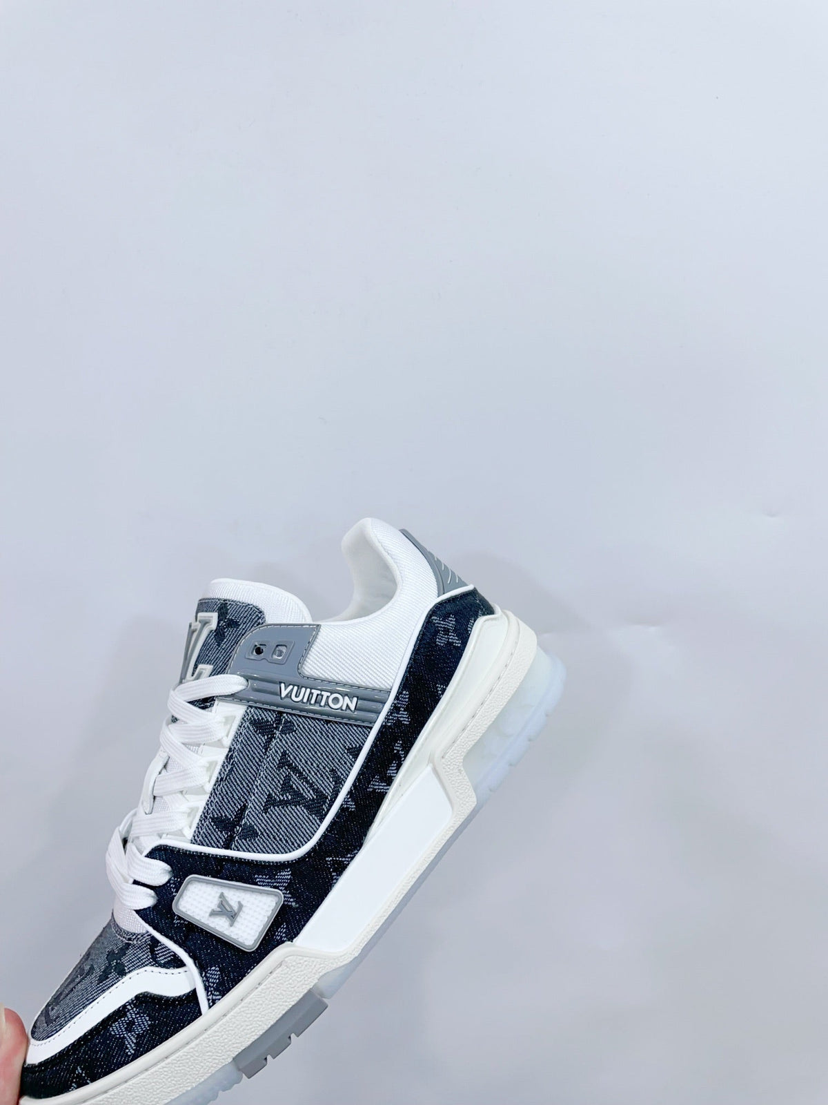 LV TRAINER SNEAKER IN DOVE GRAY MONOGRAM DENIM