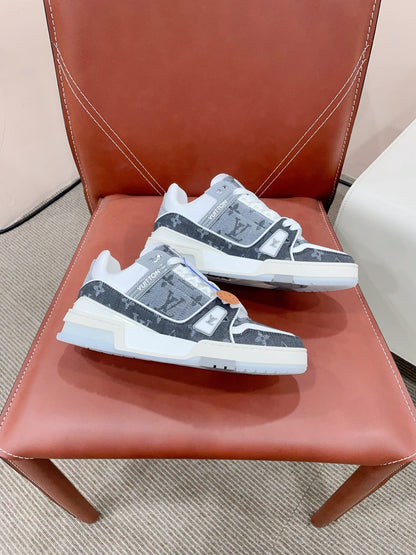 LV TRAINER SNEAKER IN DOVE GRAY MONOGRAM DENIM