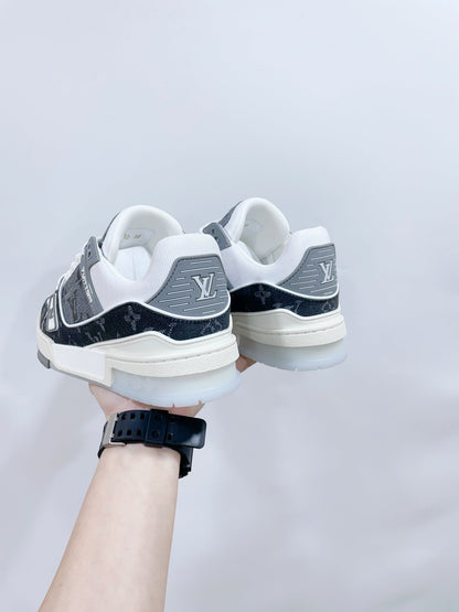 LV TRAINER SNEAKER IN DOVE GRAY MONOGRAM DENIM