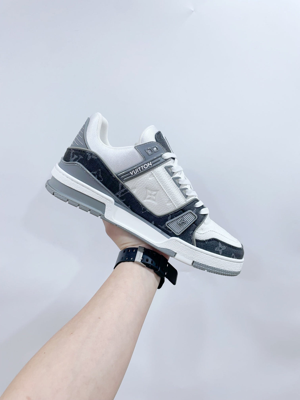 LV TRAINER SNEAKER IN WHITE CALFSKIN AND BLACK MONOGRAM DENIM